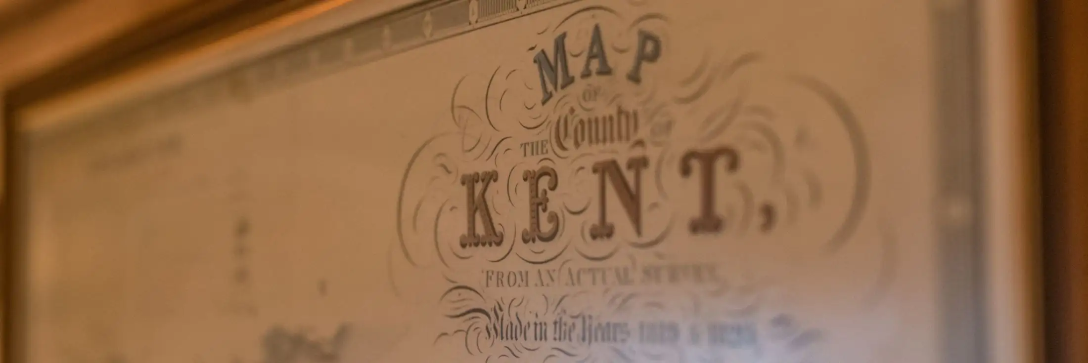 A vintage sign labelled map of the Kent county.