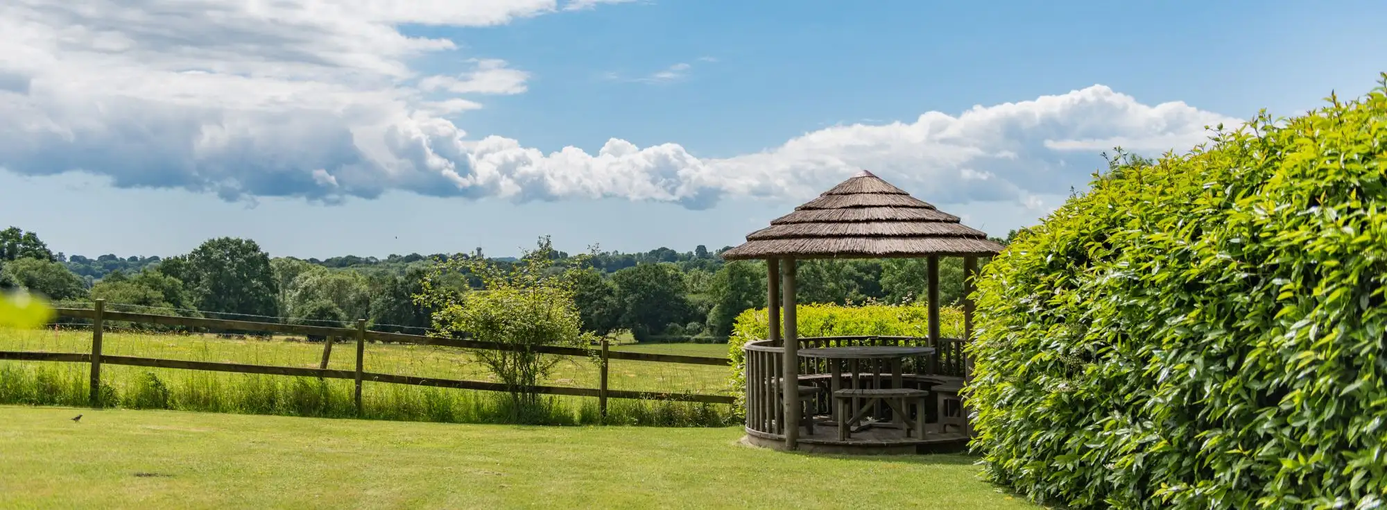 A large sunny garden with a picnic area, this is Lower Standen Farm, a big holiday home in Benenden, Kent