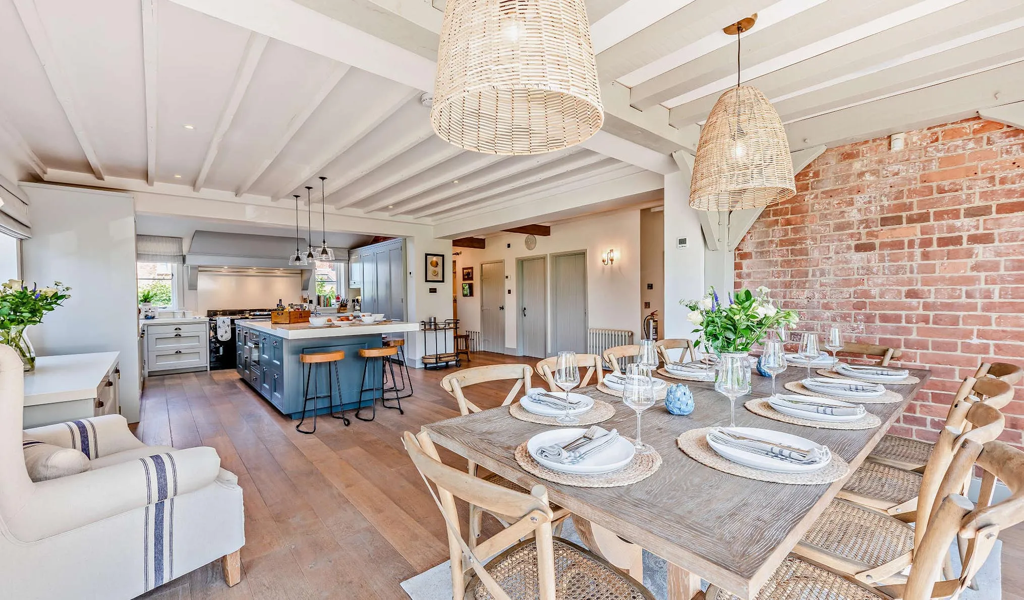 The open plan space of Bedgebury Oast looking into the kitchen and dining room.