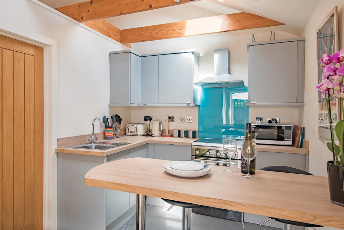 A clean and bright kitchen at The Roost