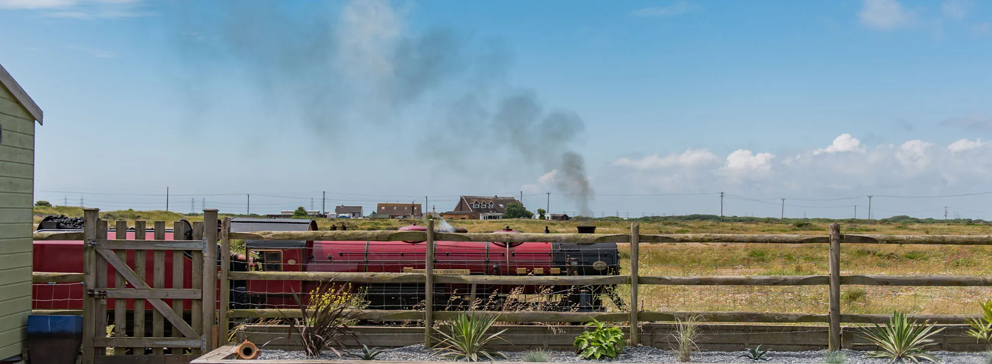 Photo of the RH&DR steam train passing through Lydd on sea, a family friendly sea side destination in Kent.
