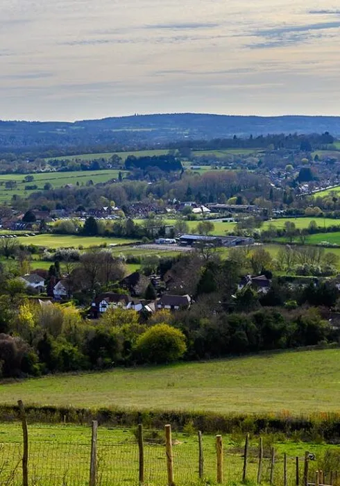 A wide, open view of the countryside hills in Sevenoaks, Kent, a lovely place for walking holidays.