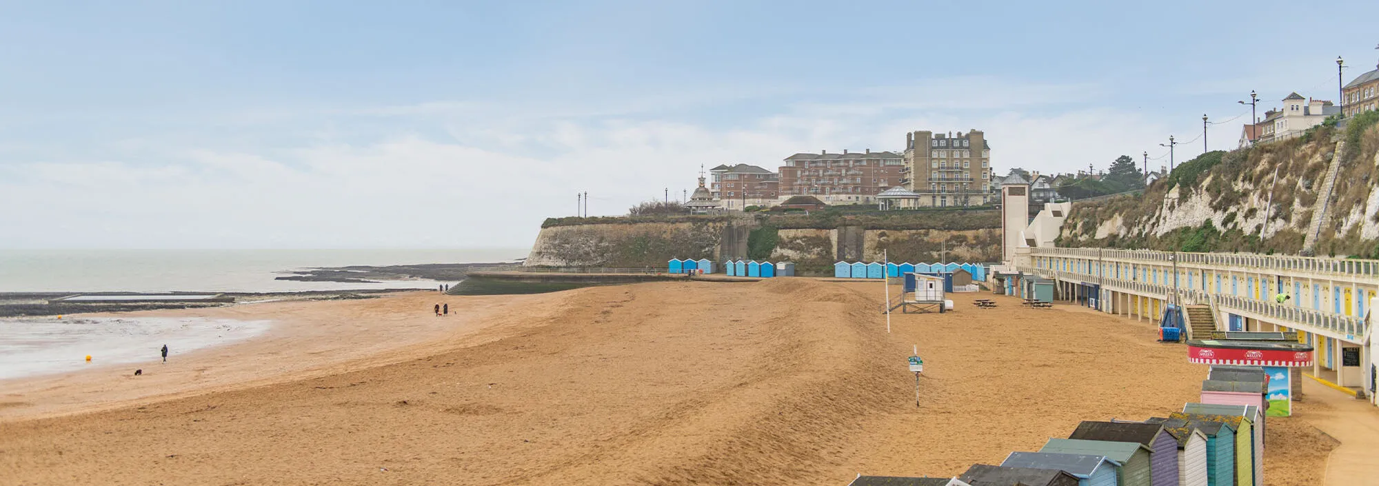 People wander the sandy beach at Joss Bay in Broadstairs