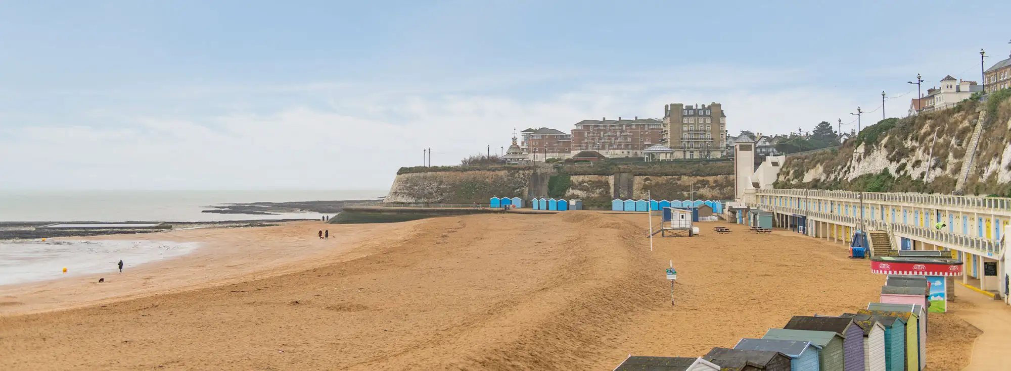 People wander the sandy beach at Joss Bay in Broadstairs
