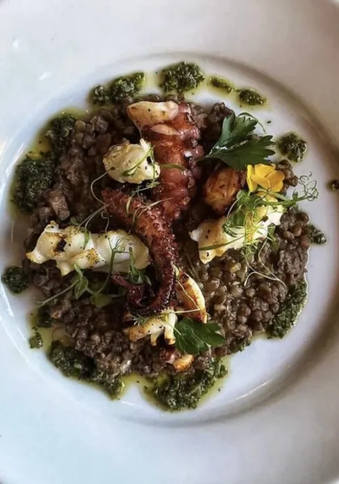 A plate of seafood and lentils served at Posilippo in Broadstairs