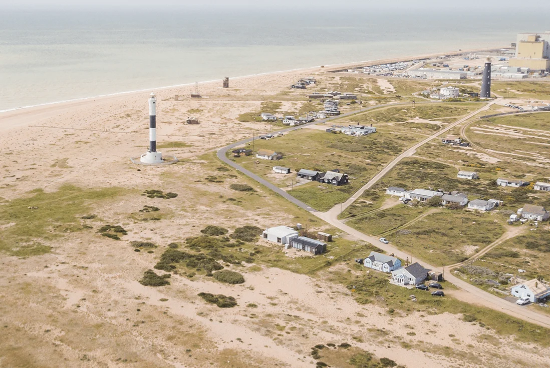 Aerial shot of the vast landscape and sandy beaches of Dungeness in Kent