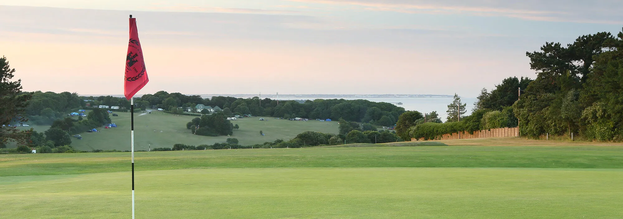 Wide open golf course at Kingdown in Kent overlooking the sea below.