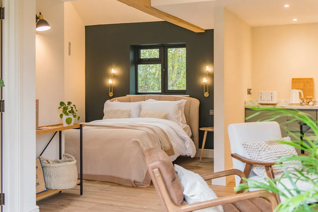 The king size bed at The Grain Store, a holiday home in Beckley just outside of Rye.