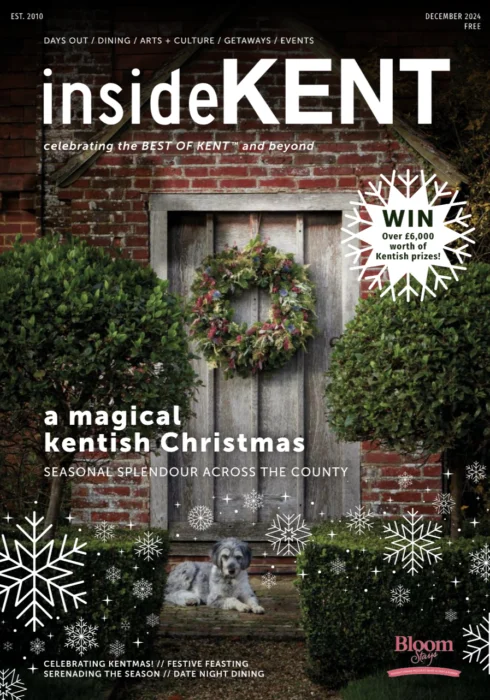 The front cover of InsideKent's December Issue, featuring a dog sat infront of Dormestone Farm, a holiday home by Bloom Stays