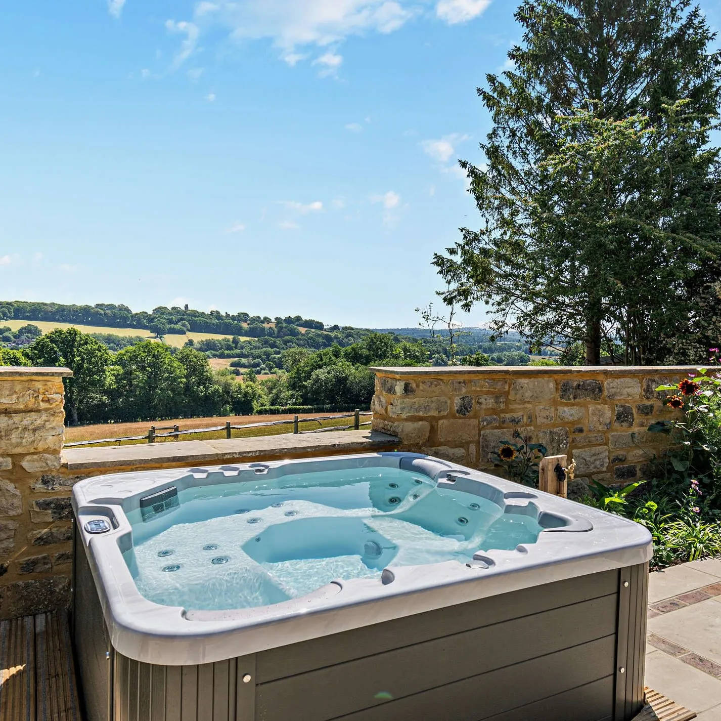 Hot tub overlooking the Weald at Dairy Barn, Blackham, nr Tunbridge Wells