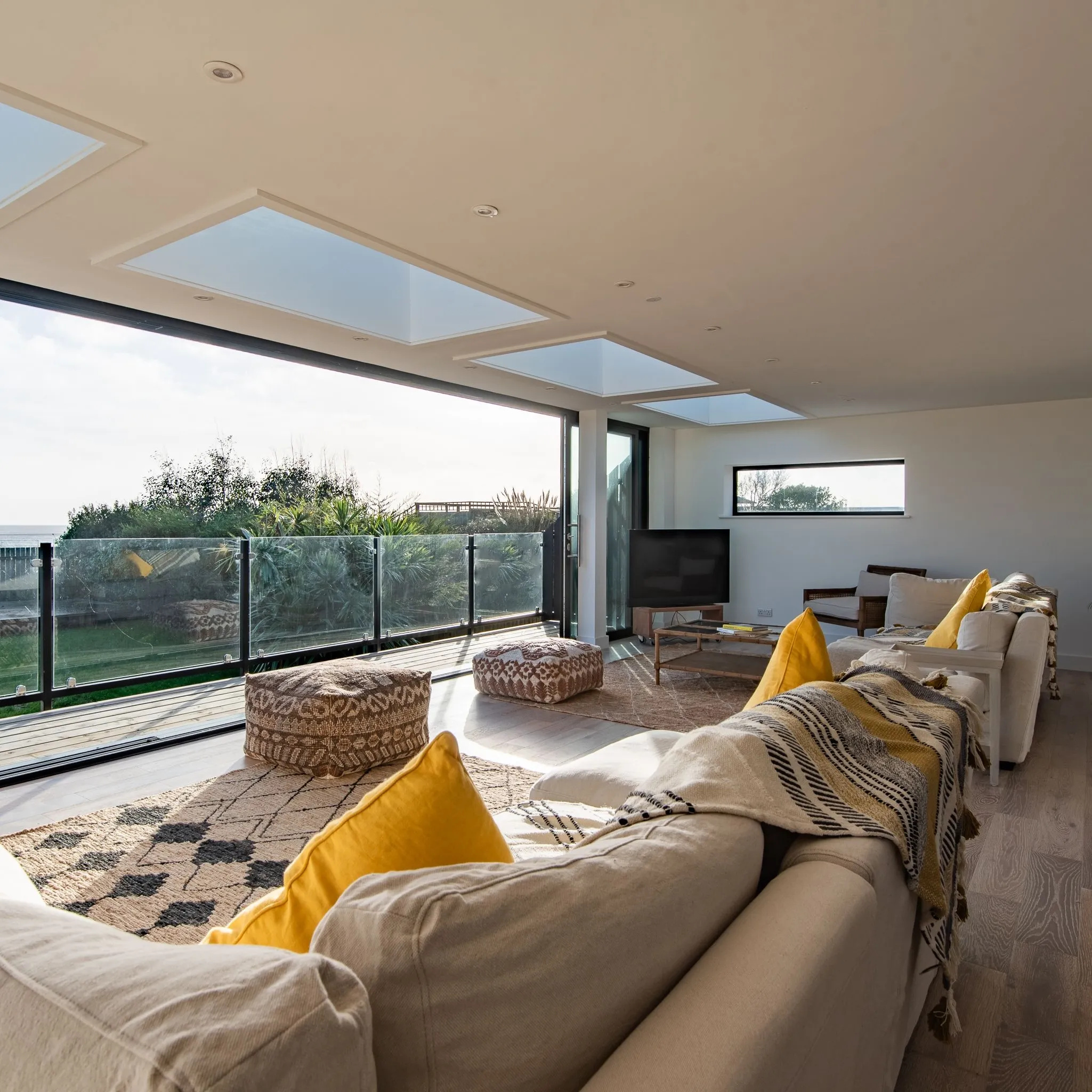 Lounge with open balcony view at Waterfront, Greatstone