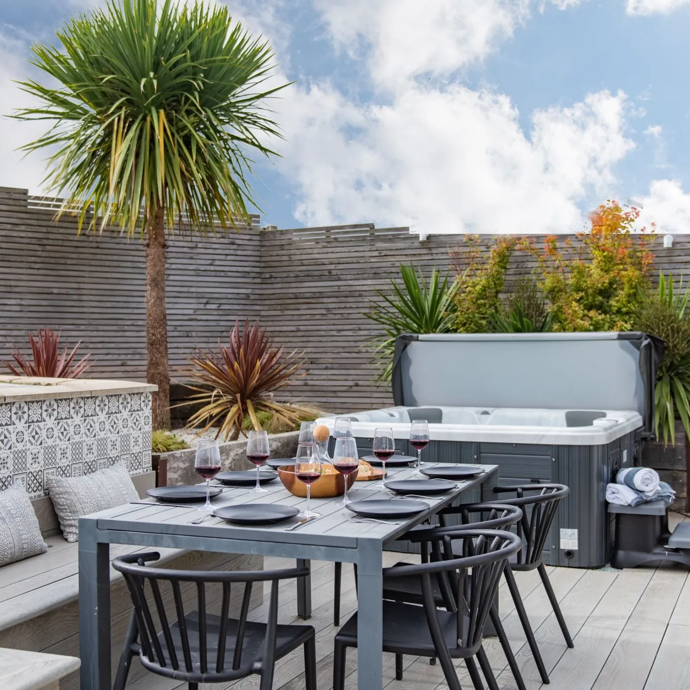 Dining terrace with hot tub at Little Beach House, Tankerton, nr Whitstable
