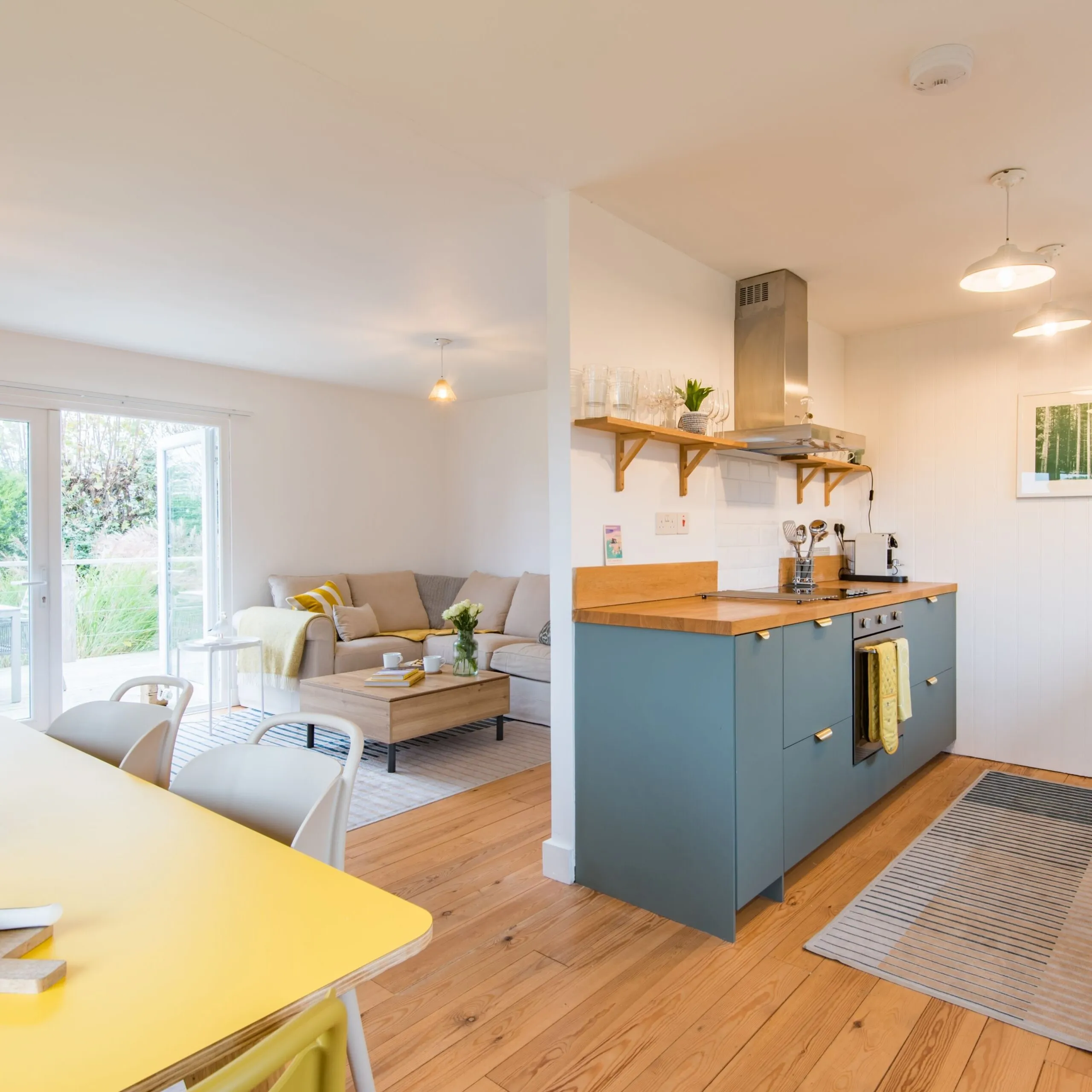 The interiors of the open plan kitchen, dining and living room space of The Cot in Winchelsea Beach.