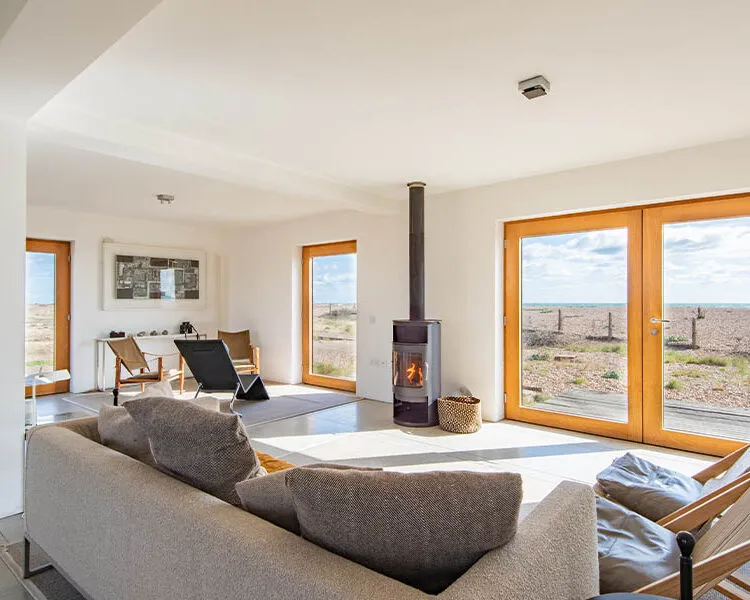 The sunny interiors of Fog Signal Building, a holiday home in Dungeness