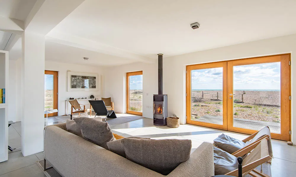 The sunny interiors of Fog Signal Building, a holiday home in Dungeness