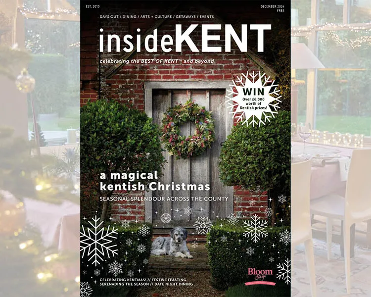 The Christmas front cover of InsideKent magazine, showing a dog sat in front of a Dormestone Farm, a holiday home by Bloom Stays