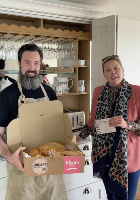 Dan and Rowena presenting the Docker weekend pastry box | Bloom Stays